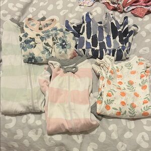 Assorted Baby Onesies with Floral and Striped Patterns